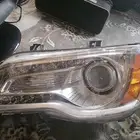 نور امامي يسار كرايسلر 2014 نضيف جدا وشغال 100