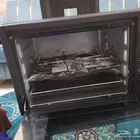فرن ومكنسه كهربا