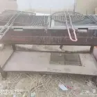 شواية فحم استخدام قليل متينه حديد تقيل معها بعض الأغراض