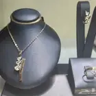 نصف طقم ذهب أصفر خالص عيار 18 مرصع بالزركون الوزن 7.5 جرام