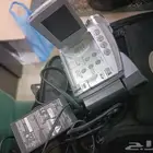 كامرا كانون قديمه تحتاج صيانه وتلفون لاسلكي بانسونك يعمل