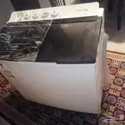 أغراض للبيع   غسالة 12 كيلو و ميكرويف 30 لتر