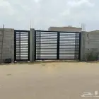 أبواب حديد وأبواب خشب وأبواب المنيوم وأبواب سحاب جلدو هناجر