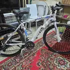 دراجه رياضيه 7 سرعات شبه جديده .