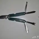 سكين ومقص ومجموعة أدوات في قطعة واحده