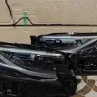 صدام أمامي كامري 2025 أبيض لؤلؤي وطقم شمعات وكاله