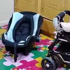 عربية اطفال وكرسي سيارة