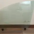 زجاج باب سائق اصلي