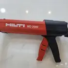 مسدس سليكون وغراء ( ثنائي ) شبه جديد هلتي صناعه سويزلاند