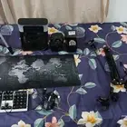 أغراض تصوير و مكيف صغير و أغراض قيمنق و ساعه يد و سماعة