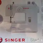 مكينة خياطه سنجر شبه جديده