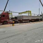 سطحة عشرين لنقل المعدات داخل وخارج المملكة العربية السعودية
