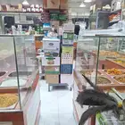 طاولة عرض مكسرات وبهارات للبيع