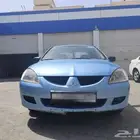 لانسر 2004 مفحوص مجدد