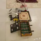 كيرم وفرفيره صغيره وكاوية ملابس وميزان وعدة للتمارين الرياضه