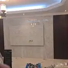 معلم ديكورات مع بويات ونجاره