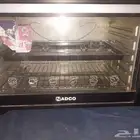فرن كهربائي كبير الحجم مع جميع ملحقاته