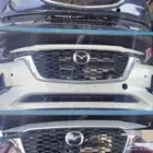 يوجد لدينا صدام مازدا نضيف وكاله