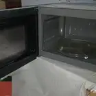 ميكرويف صغير يحتاج صيانة.ودافور صغير