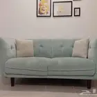 قطعة كنب بلون أزرق سماوي