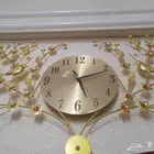 لوحات جدارية وساعة حائط