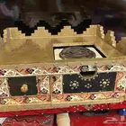 منقل مصنوع من الخشب على شكل تراثي الوان مميزة هيتر كهربائي