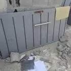 باب حديد وزنه تقريبا 8 كيلو