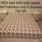 IKEA bed with side tables and mattress and 4 drawers