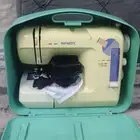 مكينة خياطة و تطريز انفنتي