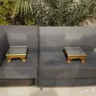 كنب رصاصي نظيف مع طاولتين صغار لايجي الا الصادق اللي بيشتري