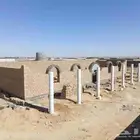 بناء طين وحجر واسقف اثل وجريد