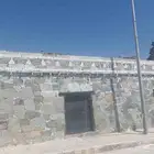 رضاكم غايتنا بناء جدران حجر وتلبيس