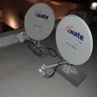 Satellite technician for installing surveillance camera scre