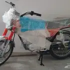 دباب AX 100 هيلكو احمر جديد زيرو