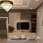 واجهت شاشه صاله بديل خشب وشيبورد مع رفوف