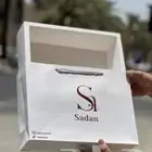 أكياس عبايات ورق تغليف ستيكر كروت شكر ليبل