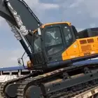 بكلين لبناء الثمايل الحجر وقص الاراضي وتسوية المزارع