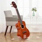 يوكليلي ukulele قيثارة جيتولالي آلات موسيقية