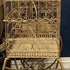 قفص حديد ذهبي