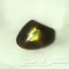 حجر عقيق ناري متغير اللون أخضر أصفر