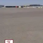 ساحة أيواء مسفلتة كبيرة في الخمرة
