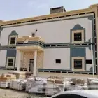 ديكورات خارجية اسمنتيه بطحاء الرياض مع كسر رخام بشكل حجر
