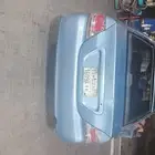 متسوبيشي لانسر 2004مفحوص مكيف شغال نظيفه