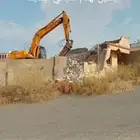 بكلين لهدم المباني السكنيه