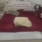 غرفة نوم وغسالة ملابس