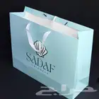 اكياس استكرات ورق زبدة اكواب بوكسات كيس ستكر كوب تيشرتات بنر