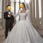 تفصيل فساتين ملكة