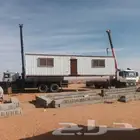 ونش رفع غرف جاهزه نقل بركسات نقل كنتينرات نقل حاويات