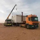 نقل كرفانات سطحه ونش نقل بركسات رافعه دبل نقل كنتينرات نقل