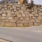 بناء جدران حجر بوكلين شيول قص اراضي بناء وتجديد بيوت قديمة